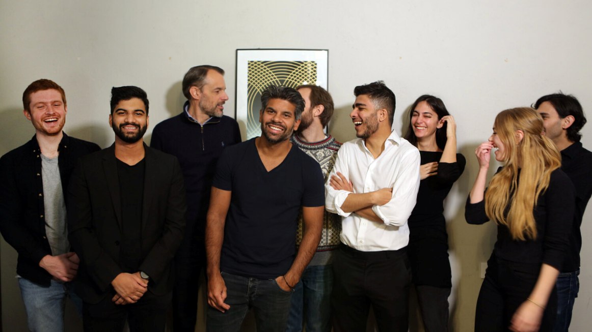 Ankit Desai, in the front wearing the white shirt, together with the Snafu Records team in Stockholm