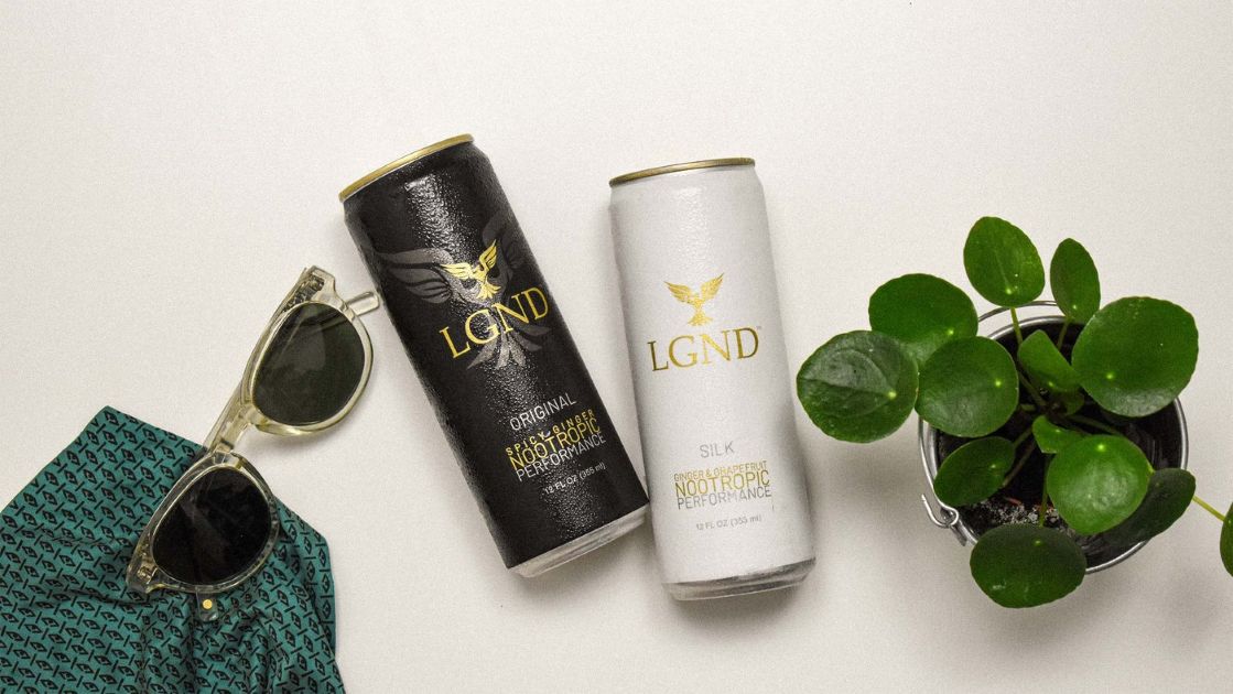 LGND drinks on a table with a plant and glasses