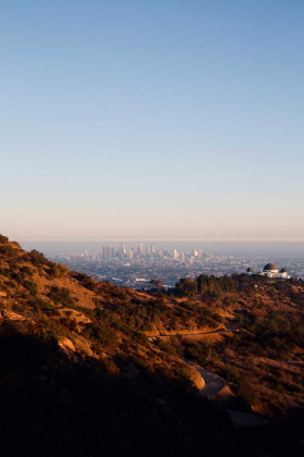 A panoramic view from a hilltop overlooking the city of Los Angeles