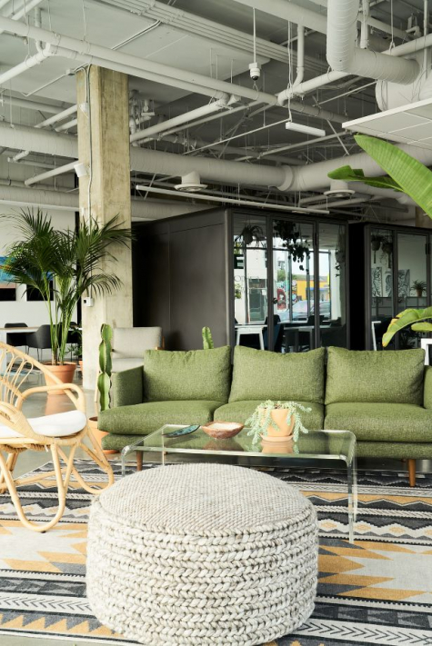 A couch and table in the YOUBE office