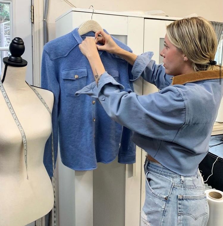 Hanna working on a wonderful blue knitted shirt.