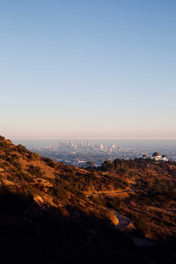 A panoramic view from a hilltop overlooking the city of Los Angeles