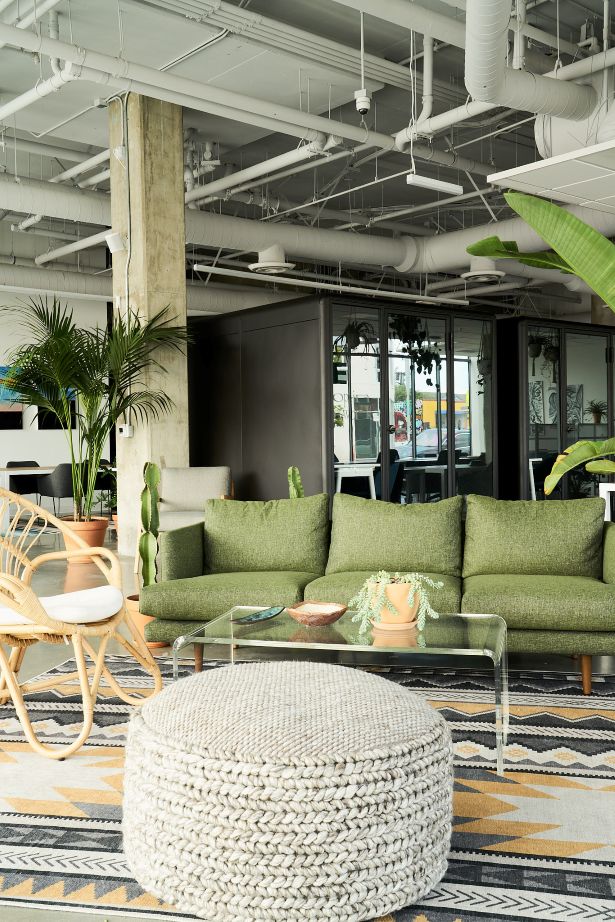 A couch and table in the YOUBE office